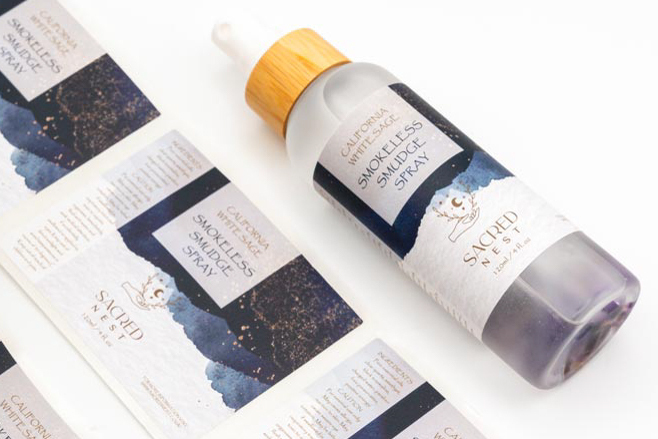 Product label on clear spray bottle with cap