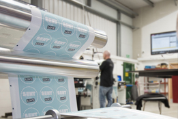 Photo of labels being printed with our machines
