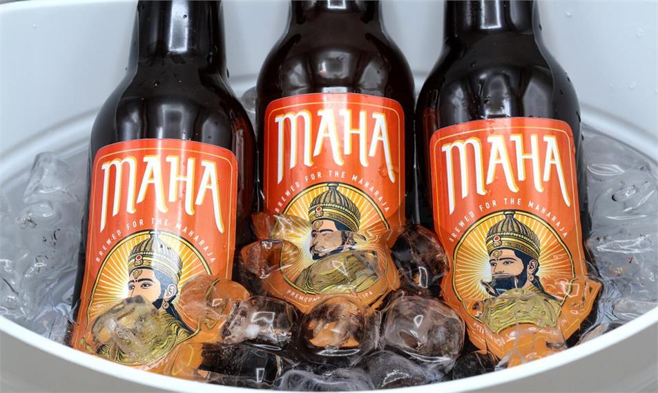 Weatherproof labels on beverage bottles in ice bucket