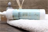 Gold foil cosmetic vinyl labels on skincare cream bottle