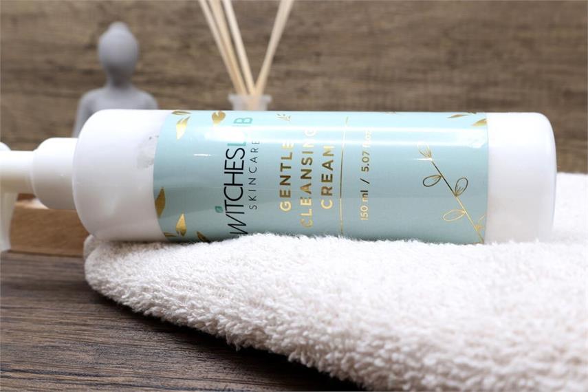 Gold foil cosmetic vinyl labels on skincare cream bottle